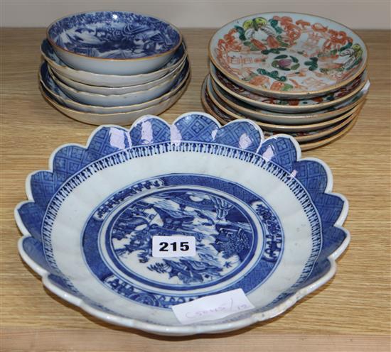 A group of 18th/19th century Chinese famille rose and blue and white saucers dishes tallest 23cm